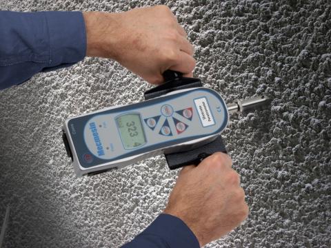Demonstration of shotcrete penetrometer force tester applied to sprayed concrete surface